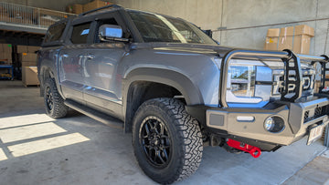 Gray BYD Shark 6 truck with off-road accessories