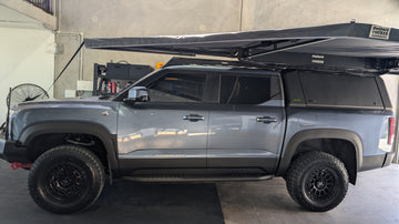 BYD Shark 6 with a roof rack and canopy
